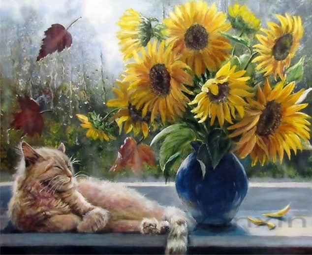 Gato y girasoles